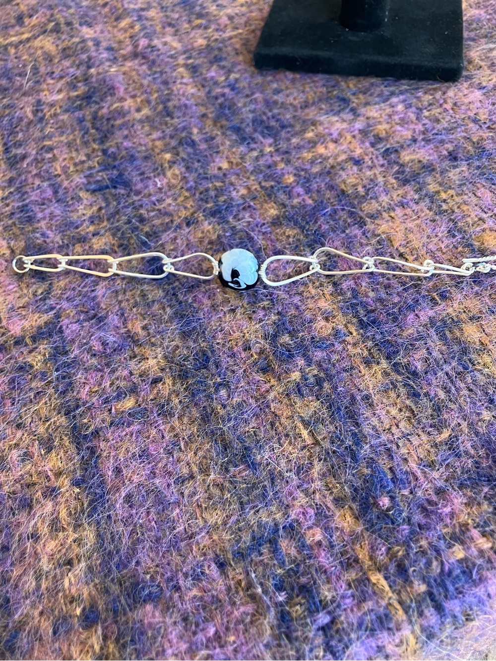 Silver Tone Link Bracelet with Round Floral Accent